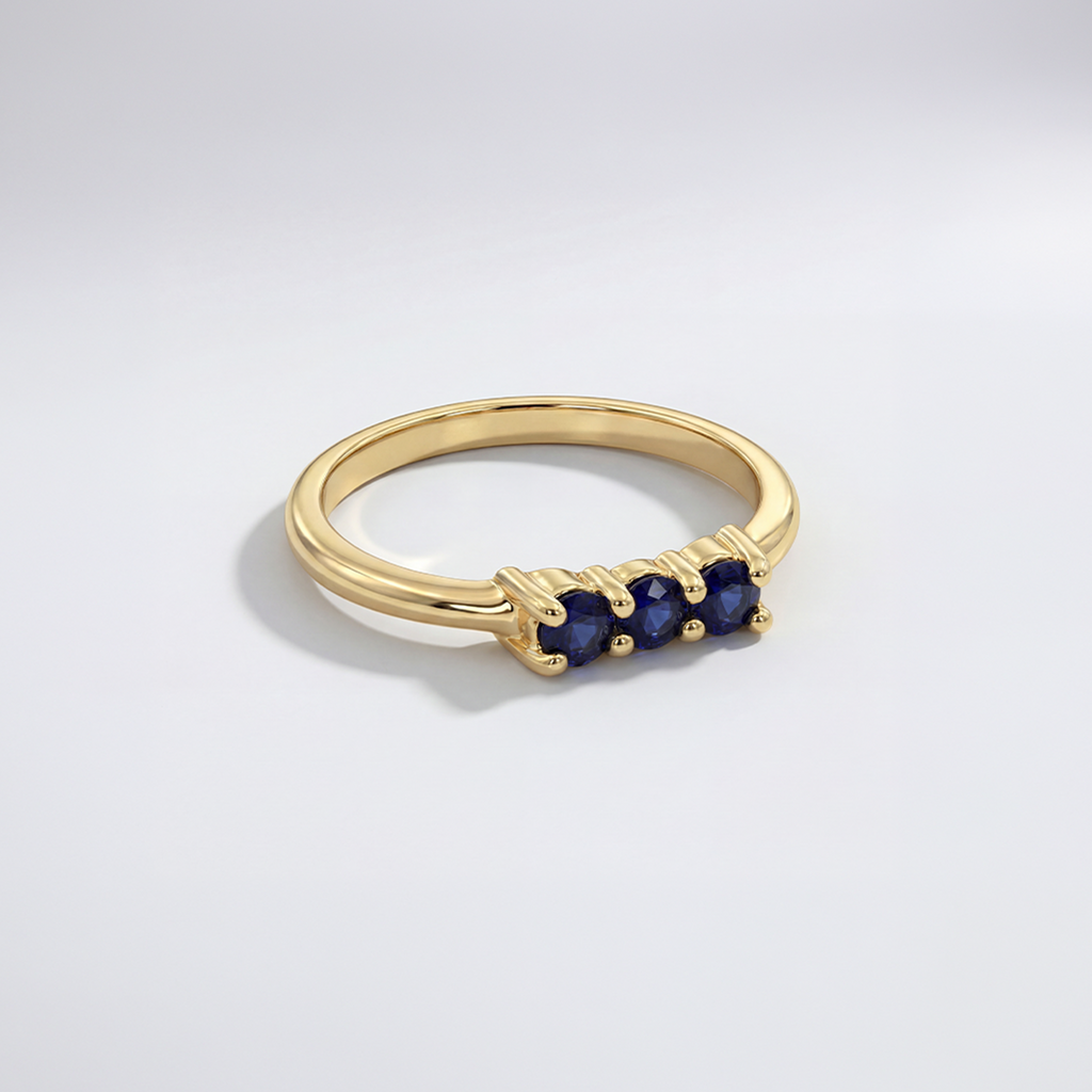 RB Jewelry Trio Stone Ring - slim gold ring with three blue stones in a row