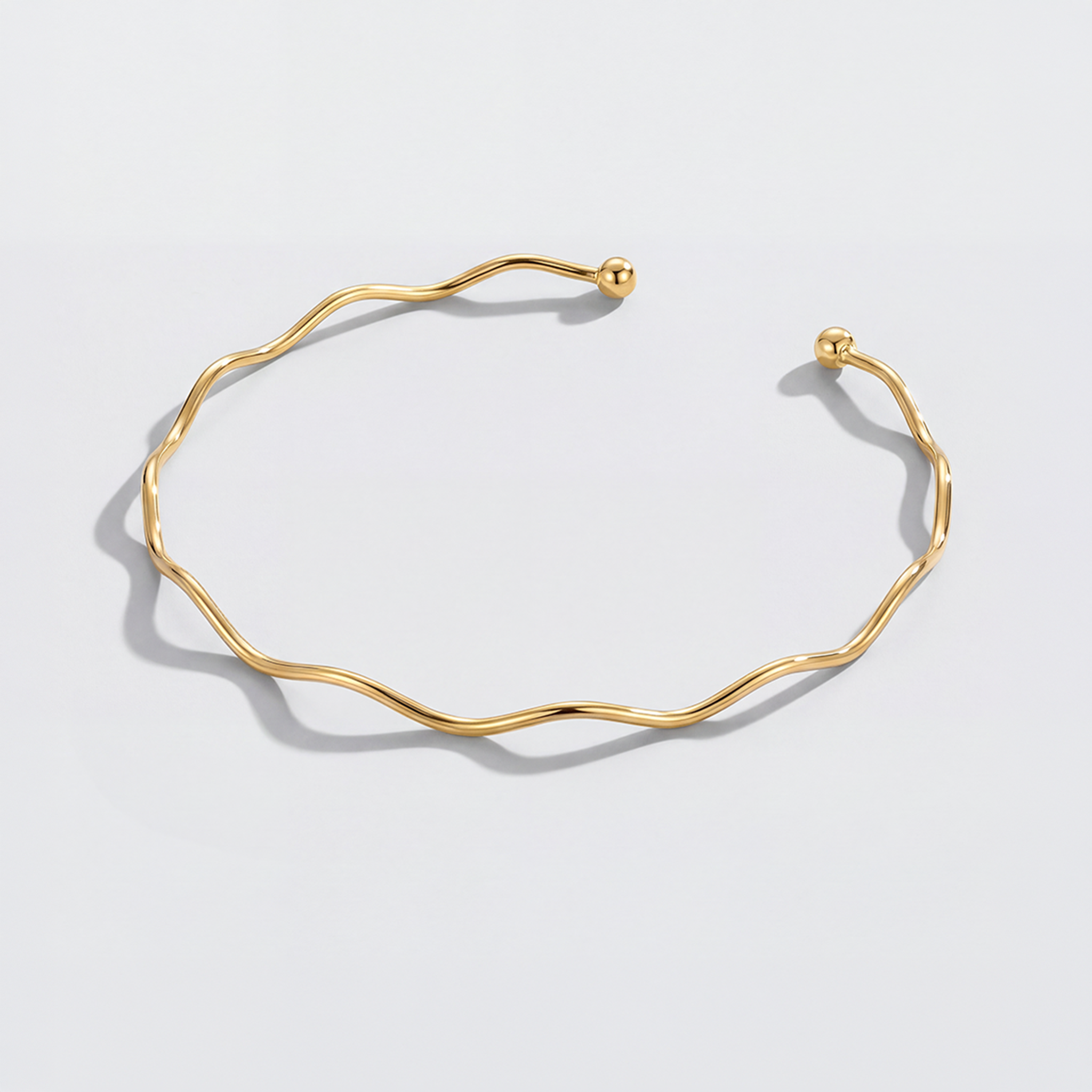 RB Jewelry Wave Necklace - minimal gold wave necklace close up detail
