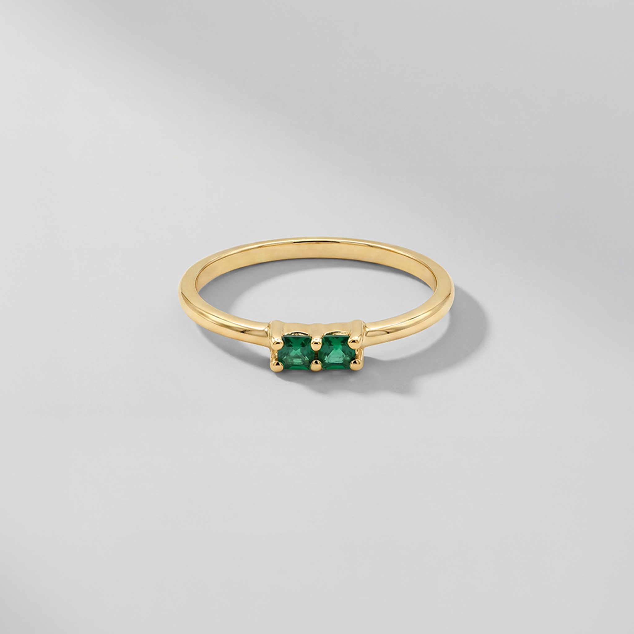 RB Jewelry Twin Band Ring - delicate gold ring with two green stones