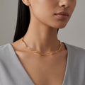 RB Jewelry Wave Necklace - structured gold necklace with irregular wave shape