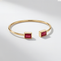 RB Jewelry Ruby Cuff - slim gold open cuff bracelet with red stone ends